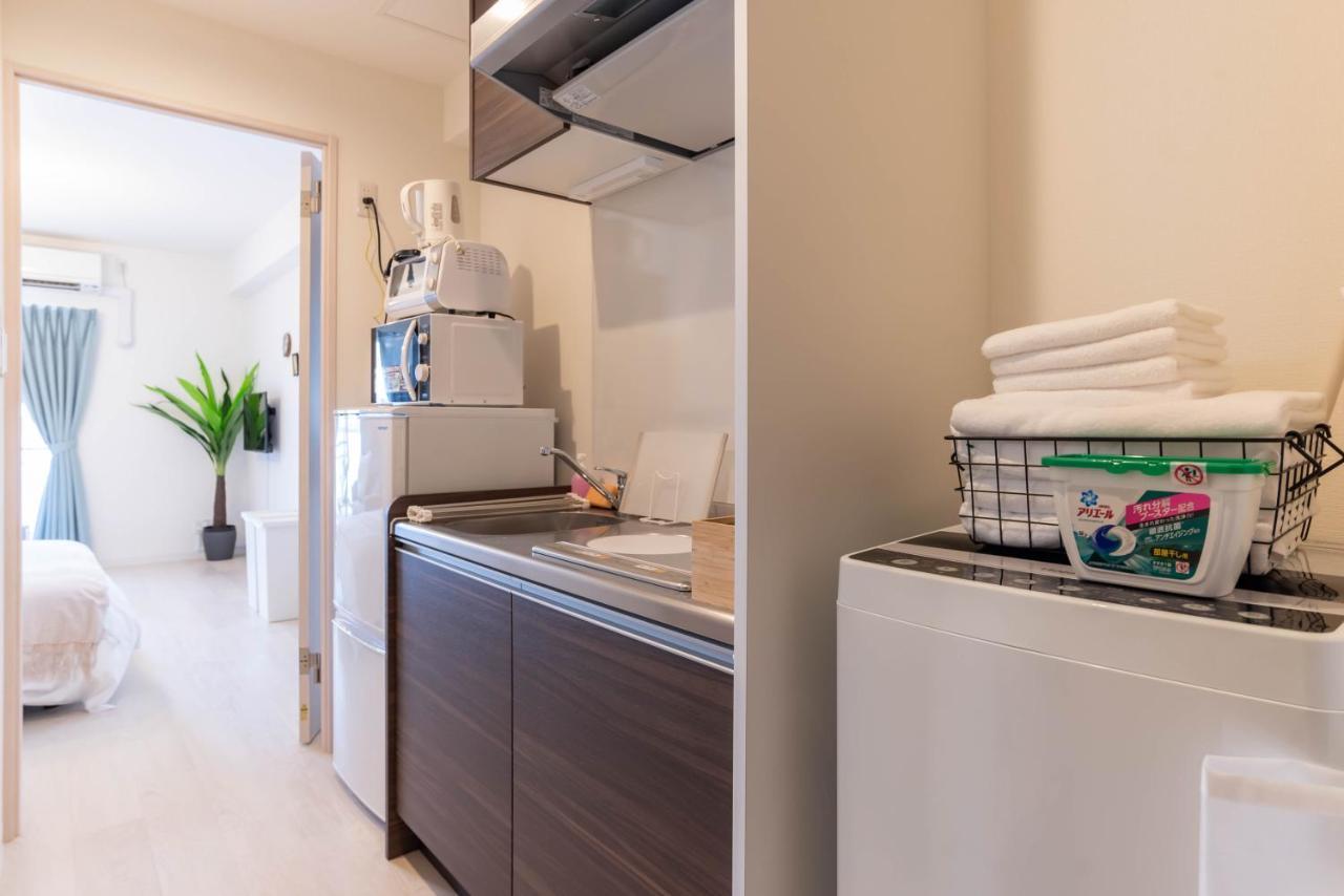 Bijou Suites Lieto Apm Osaka Bagian luar foto